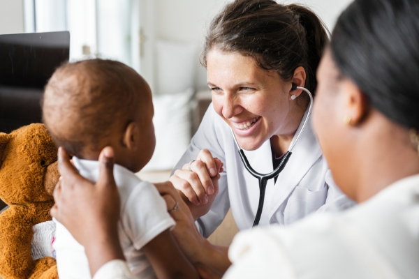 Doctor looking at a baby